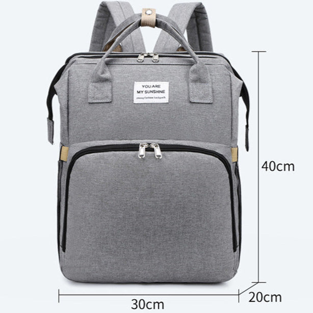 [Paga en Casa] Mochila Mudador 2 en 1 – Cambia a tu Bebé Donde Quieras 👶🎒